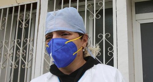 Медицинский работник. Фото: REUTERS/Ramzi Boudina