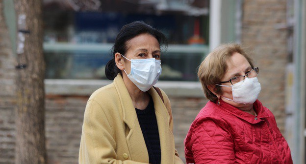 Женщины в масках. Фото Инны Кукуджановой для "Кавказского узла" 