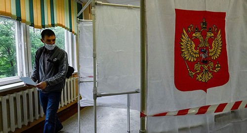 На избирательном участке. Фото: REUTERS/Yuri Maltsev