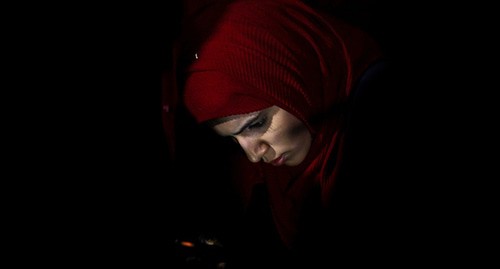 Женщина-мусульманка. Фото: REUTERS/Ammar Awad