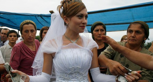 Свадьба на Кавказе. Фото: Reuters /Thomas Peter (RUSSIA)