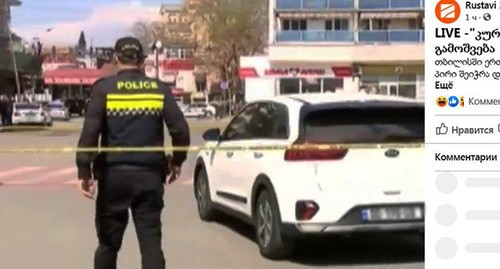 Полицейские оцепили территорию на месте захвата заложников в филиале "Банка Грузии". Тбилиси, 16 апреля 2021 г. Скриншот видео https://www.facebook.com/rustavi2/videos/501997714158663