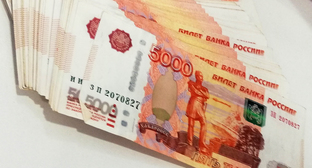 Деньги. Фото Нины Тумановой для "Кавказского узла"