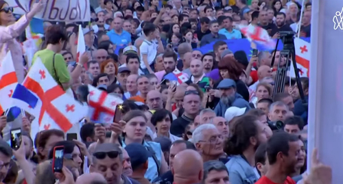 Акция «Домой, в Европу» в Тбилиси 3 июля 2022 года. Стоп-кадр из видео https://www.youtube.com/watch?v=CMYjiI3cMu0
