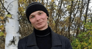 Евгений Семенов. Скриншот фото из Telegram-канала "ОВД-Инфо" (признан иноагентом) от 21.02.25, https://t.me/ovdinfolive/36653.

